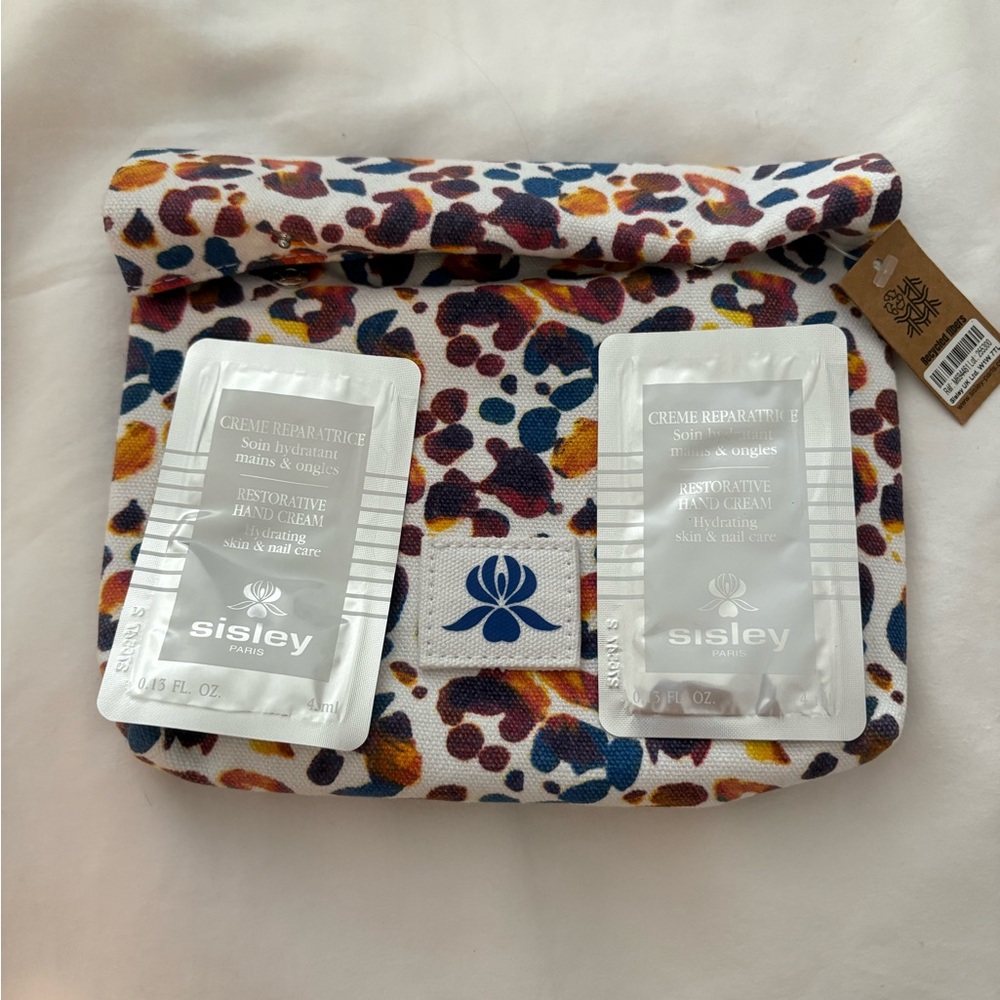 Sisley Multicolor Patterned Pouch with Hand Cream Samples